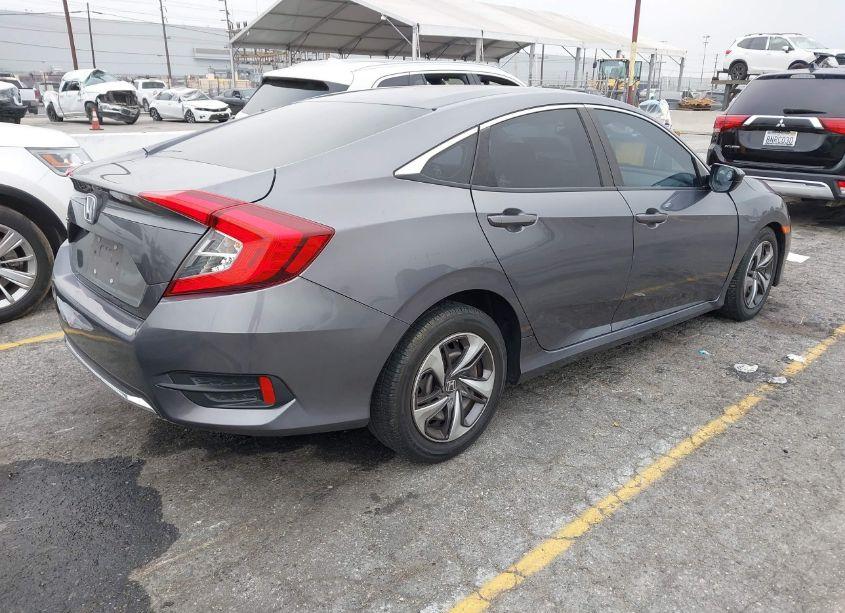 Photo 4 of 2019 Honda Civic LX (VIN 19XFC2F60KE201254)