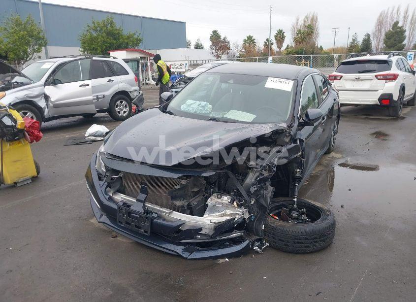 Photo 2 of 2019 Honda Civic LX (VIN 19XFC2F60KE207023)