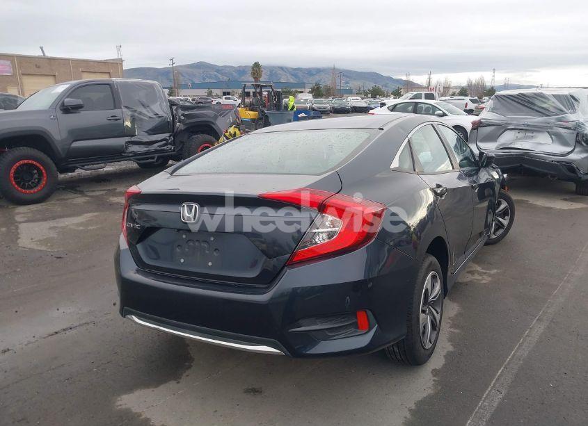 Photo 4 of 2019 Honda Civic LX (VIN 19XFC2F60KE207023)