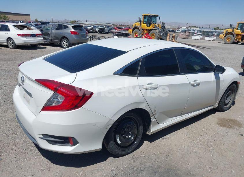 Photo 4 of 2019 Honda Civic LX (VIN 19XFC2F60KE208043)