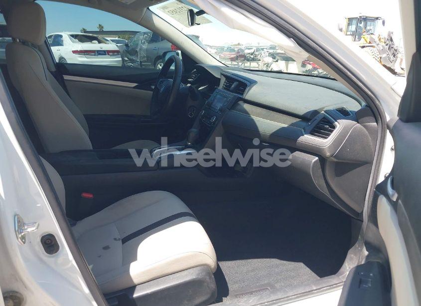 Photo 5 of 2019 Honda Civic LX (VIN 19XFC2F60KE208043)