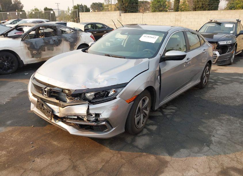 Photo 2 of 2019 Honda Civic LX (VIN 19XFC2F60KE209905)