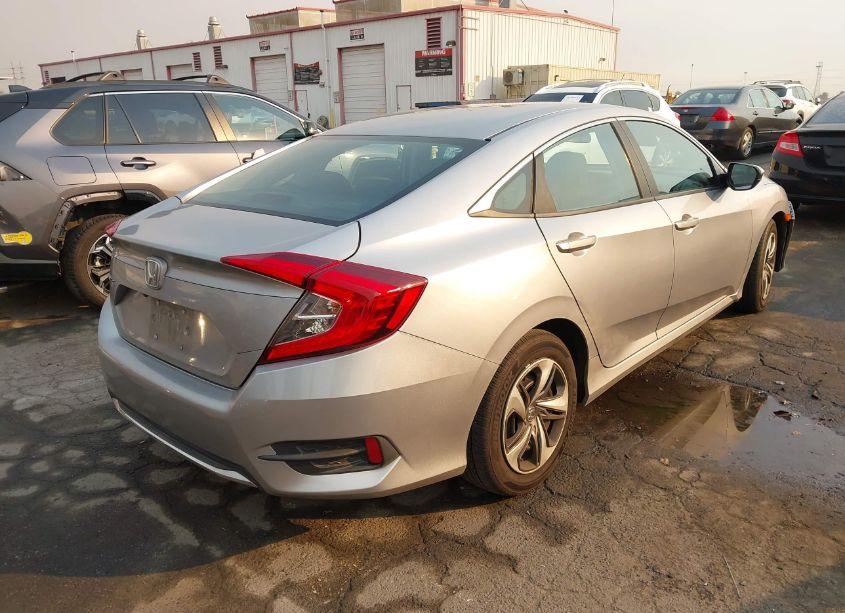 Photo 4 of 2019 Honda Civic LX (VIN 19XFC2F60KE209905)