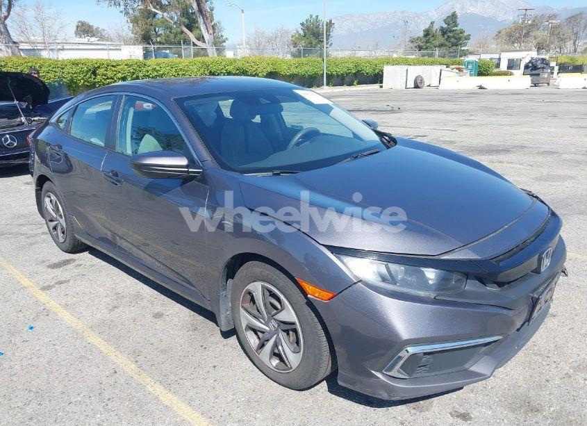 2019 Honda Civic LX (VIN 19XFC2F60KE211654) main photo