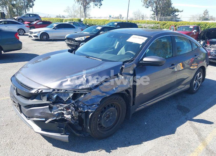 Photo 2 of 2019 Honda Civic LX (VIN 19XFC2F60KE211654)