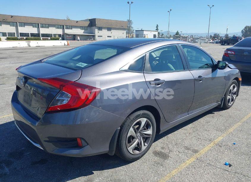 Photo 4 of 2019 Honda Civic LX (VIN 19XFC2F60KE211654)