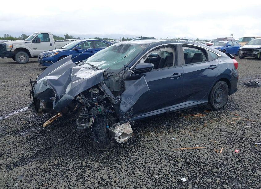 Photo 2 of 2020 Honda Civic LX (VIN 19XFC2F60LE216810)