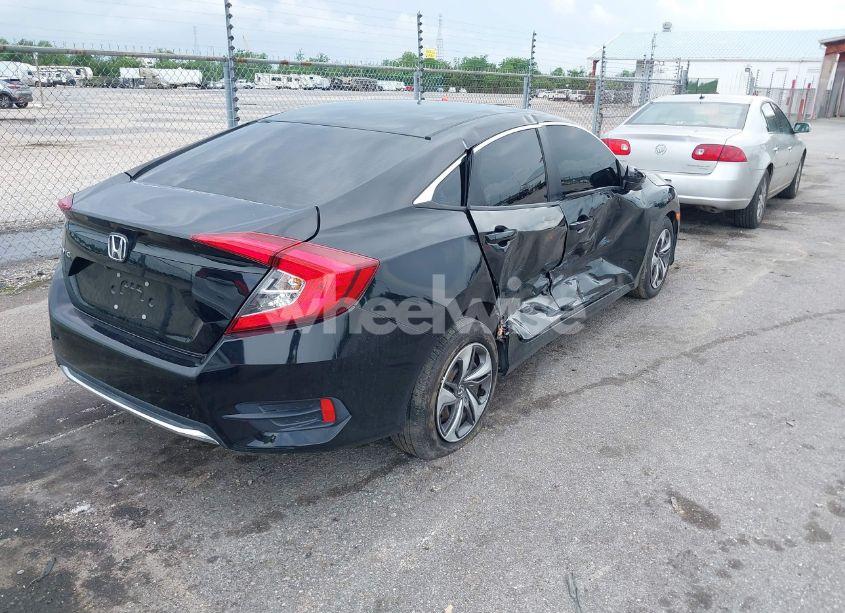 Photo 4 of 2019 Honda Civic LX (VIN 19XFC2F61KE049212)