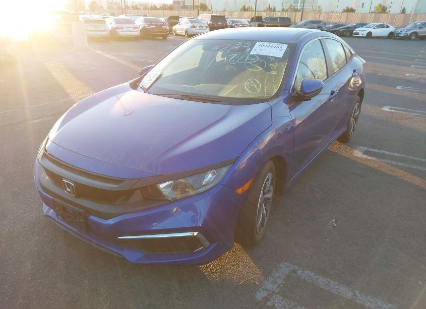 Photo 2 of 2019 Honda Civic LX (VIN 19XFC2F61KE211436)