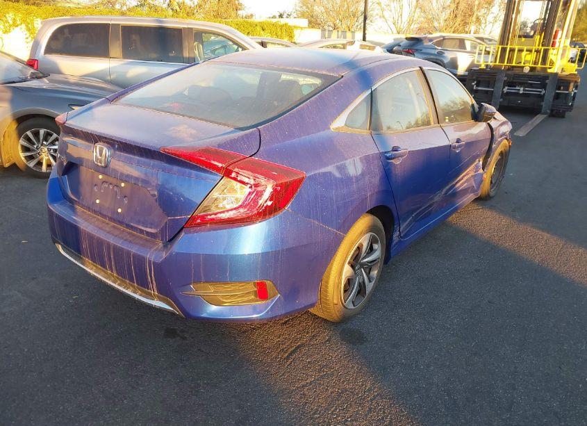 Photo 4 of 2019 Honda Civic LX (VIN 19XFC2F61KE211436)