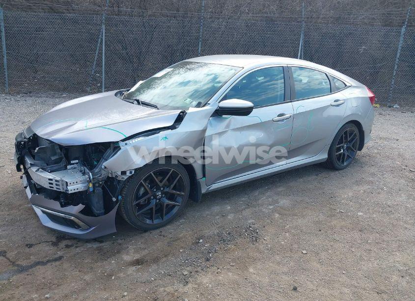 Photo 2 of 2020 Honda Civic LX (VIN 19XFC2F61LE012873)