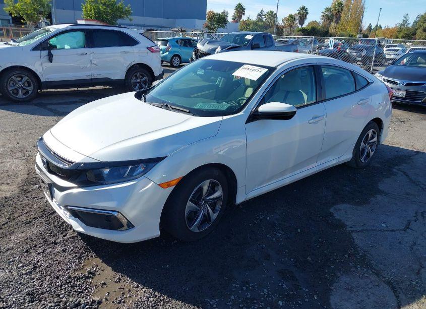 Photo 2 of 2020 Honda Civic LX (VIN 19XFC2F61LE204777)