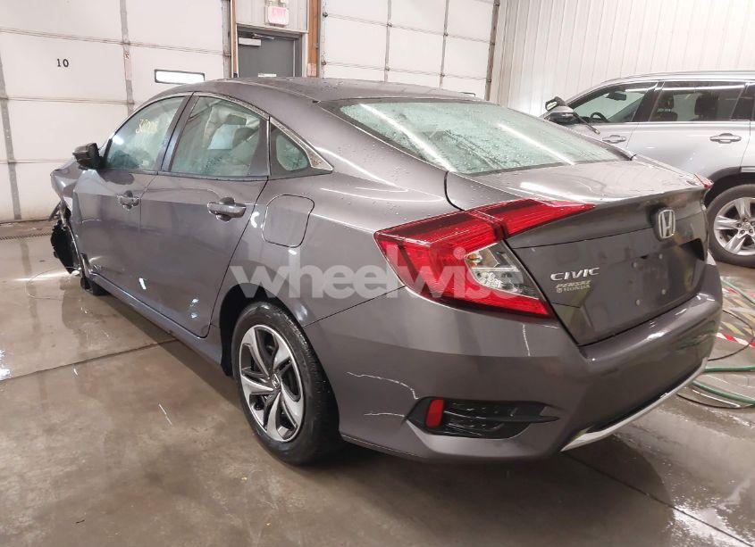 Photo 3 of 2021 Honda Civic LX (VIN 19XFC2F61ME001485)