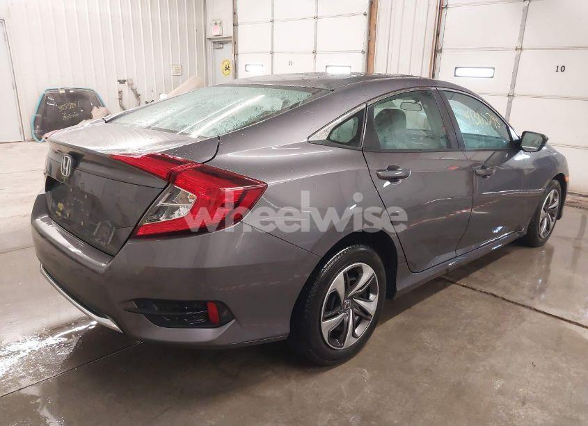 Photo 4 of 2021 Honda Civic LX (VIN 19XFC2F61ME001485)
