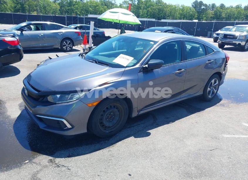 Photo 2 of 2019 Honda Civic LX (VIN 19XFC2F62KE010340)
