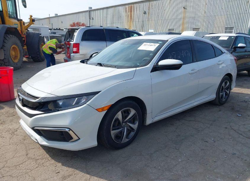 Photo 2 of 2019 Honda Civic LX (VIN 19XFC2F62KE015571)