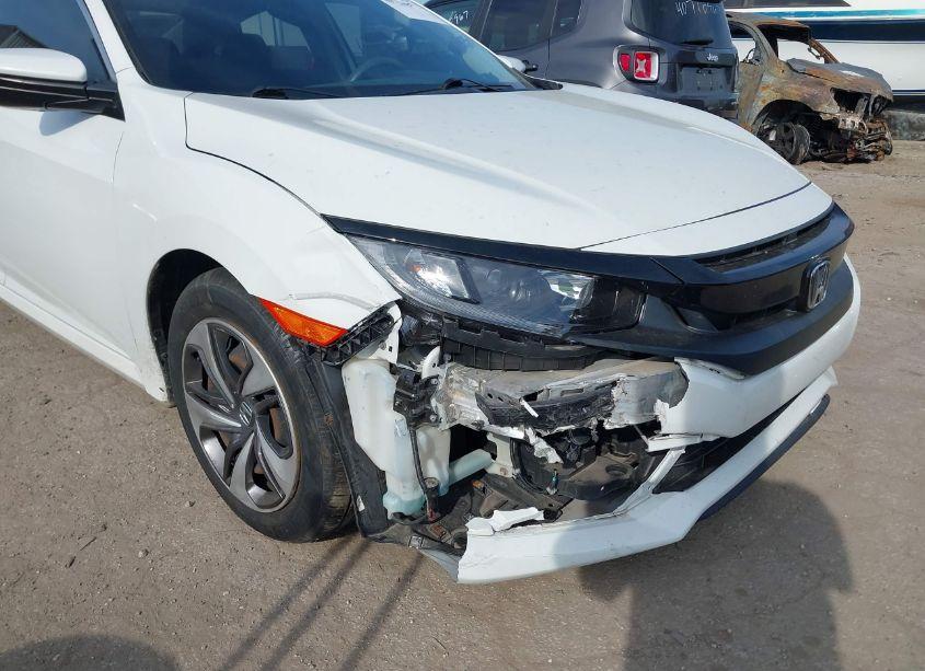 Photo 6 of 2019 Honda Civic LX (VIN 19XFC2F62KE015571)