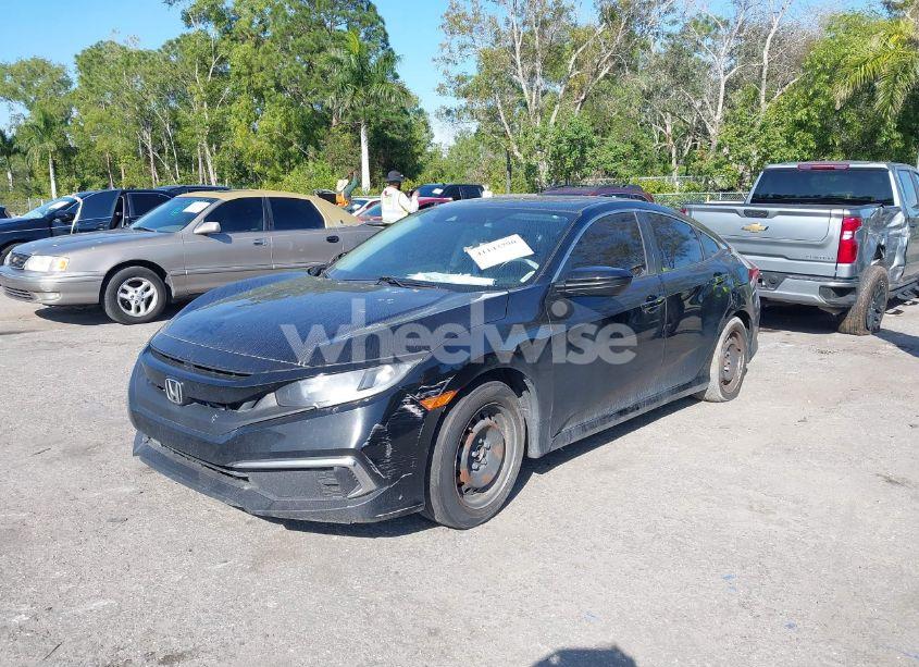 Photo 2 of 2019 Honda Civic LX (VIN 19XFC2F62KE021936)