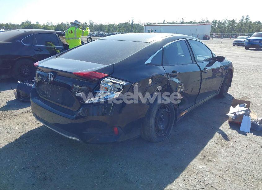 Photo 4 of 2019 Honda Civic LX (VIN 19XFC2F62KE021936)