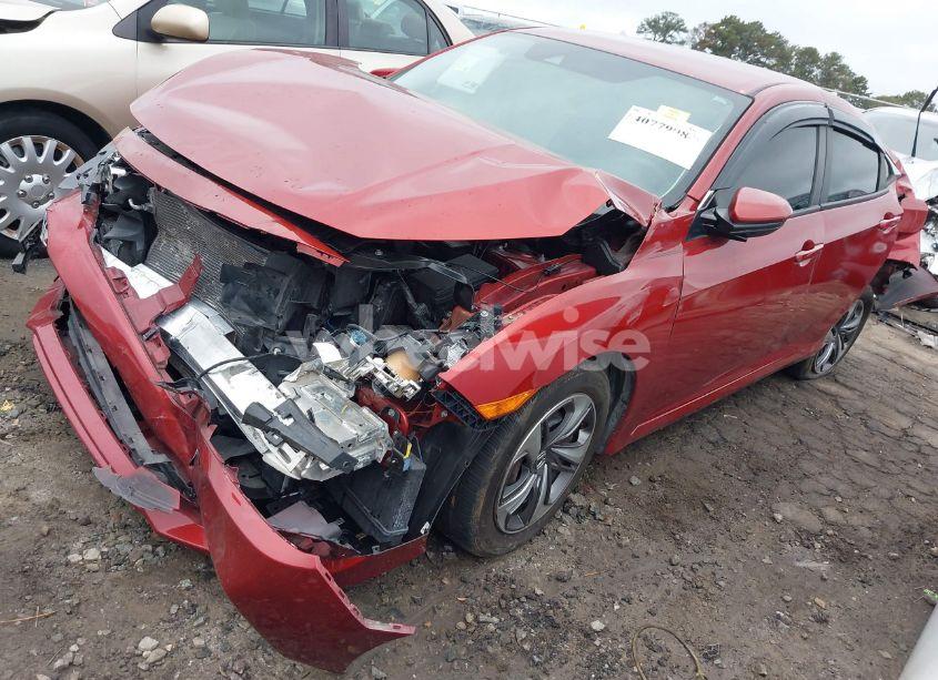 Photo 2 of 2019 Honda Civic LX (VIN 19XFC2F62KE031592)