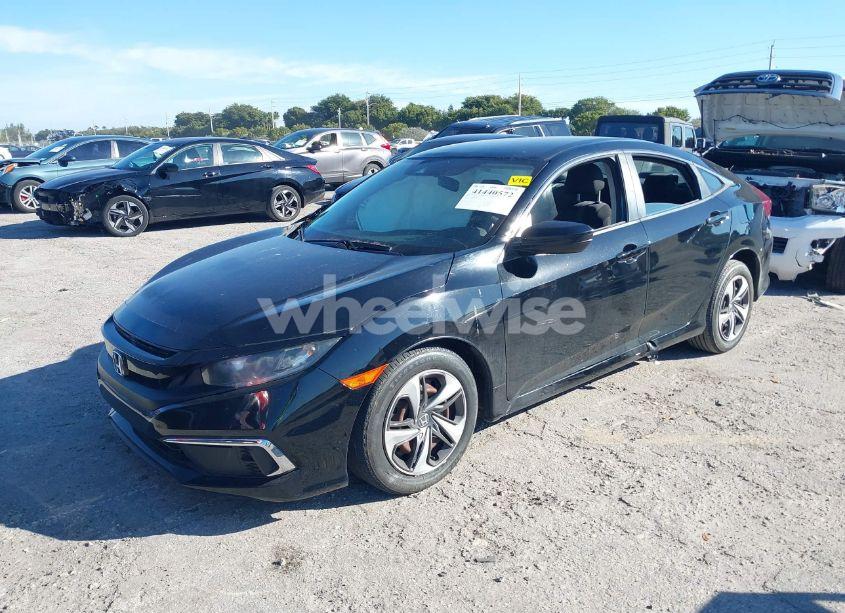 Photo 2 of 2019 Honda Civic LX (VIN 19XFC2F62KE046724)