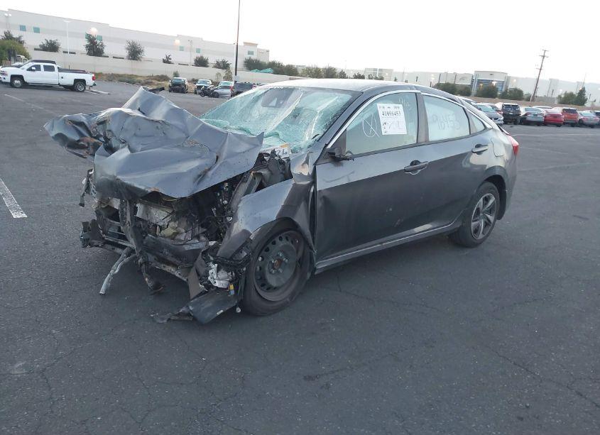 Photo 2 of 2020 Honda Civic LX (VIN 19XFC2F62LE212127)