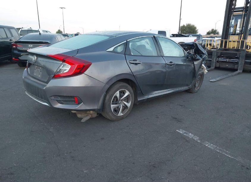 Photo 4 of 2020 Honda Civic LX (VIN 19XFC2F62LE212127)