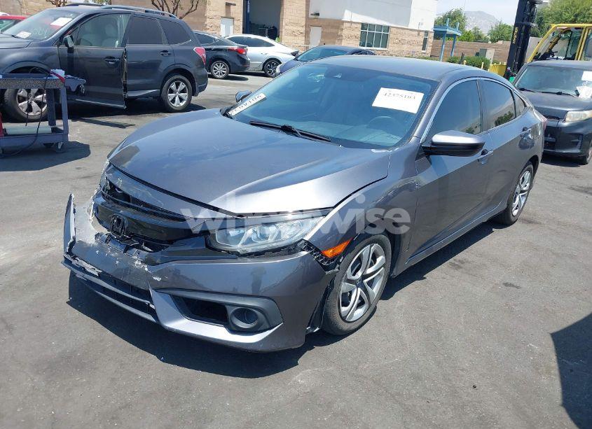 Photo 2 of 2017 Honda Civic LX (VIN 19XFC2F63HE209809)