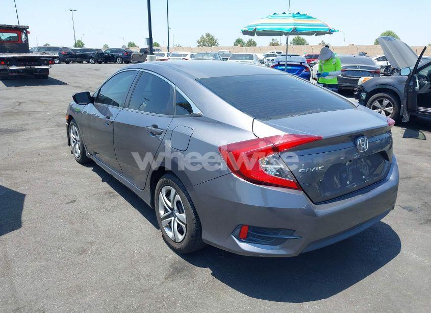Photo 3 of 2017 Honda Civic LX (VIN 19XFC2F63HE209809)