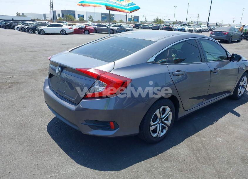 Photo 4 of 2017 Honda Civic LX (VIN 19XFC2F63HE209809)