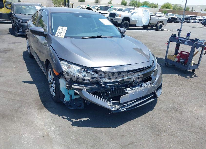 Photo 6 of 2017 Honda Civic LX (VIN 19XFC2F63HE209809)