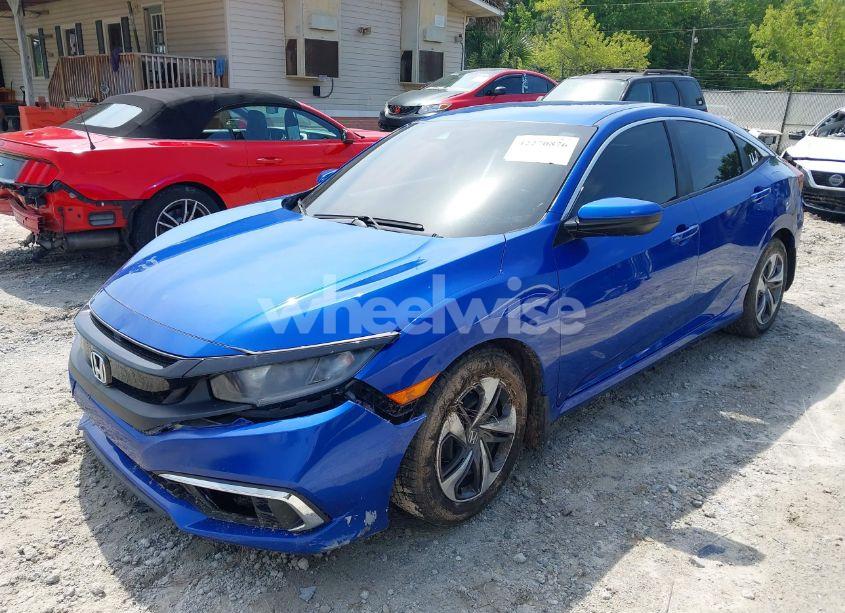 Photo 2 of 2019 Honda Civic LX (VIN 19XFC2F63KE022254)