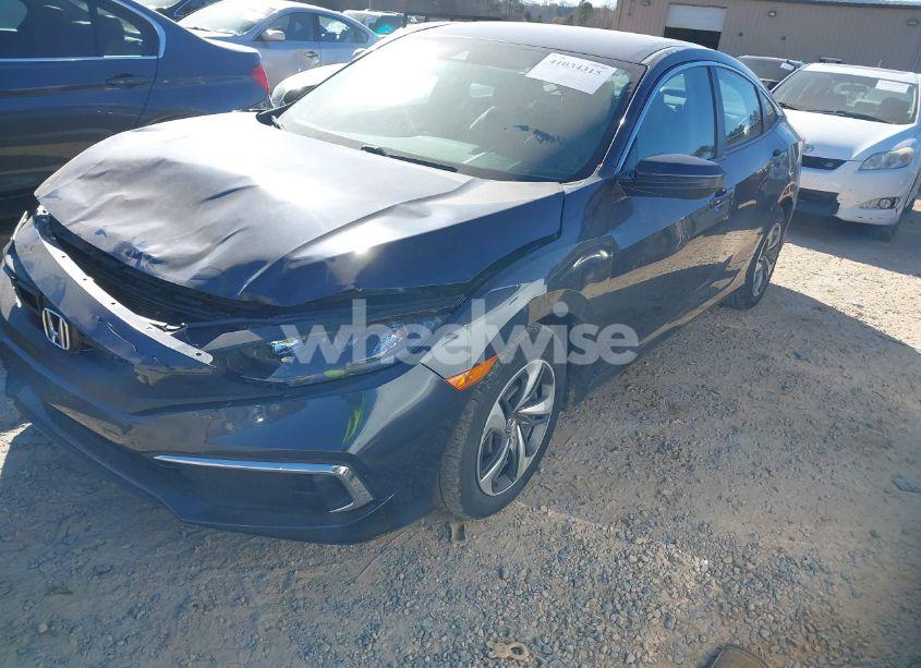 Photo 2 of 2019 Honda Civic LX (VIN 19XFC2F63KE040706)