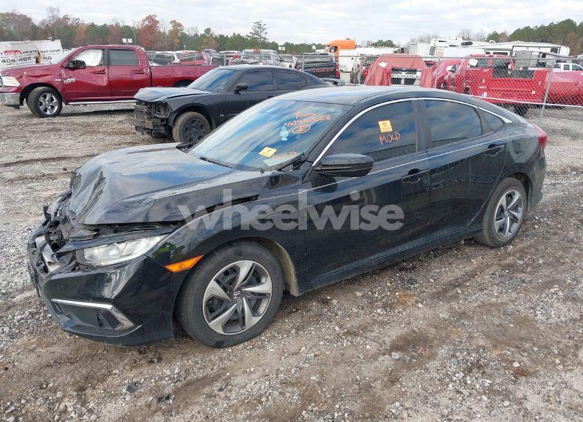 Photo 2 of 2019 Honda Civic LX (VIN 19XFC2F63KE042472)