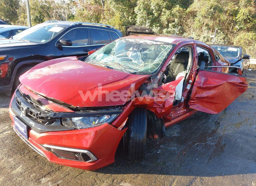 Photo 2 of 2019 Honda Civic LX (VIN 19XFC2F63KE045470)