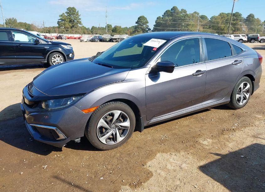 Photo 2 of 2019 Honda Civic LX (VIN 19XFC2F63KE045940)