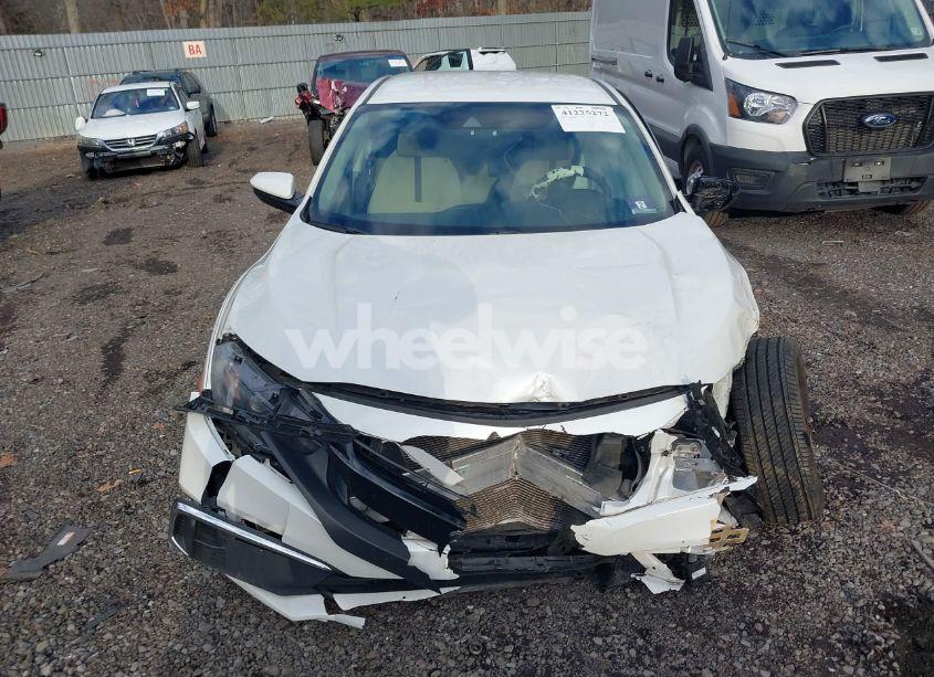 Photo 12 of 2019 Honda Civic LX (VIN 19XFC2F63KE203225)