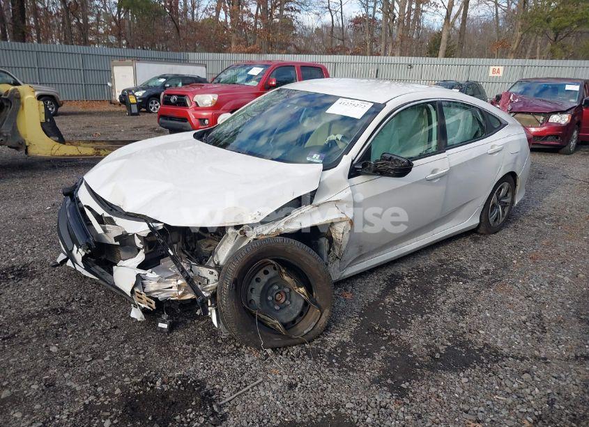 Photo 2 of 2019 Honda Civic LX (VIN 19XFC2F63KE203225)