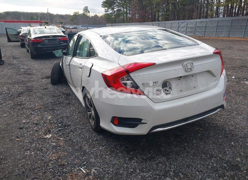 Photo 3 of 2019 Honda Civic LX (VIN 19XFC2F63KE203225)