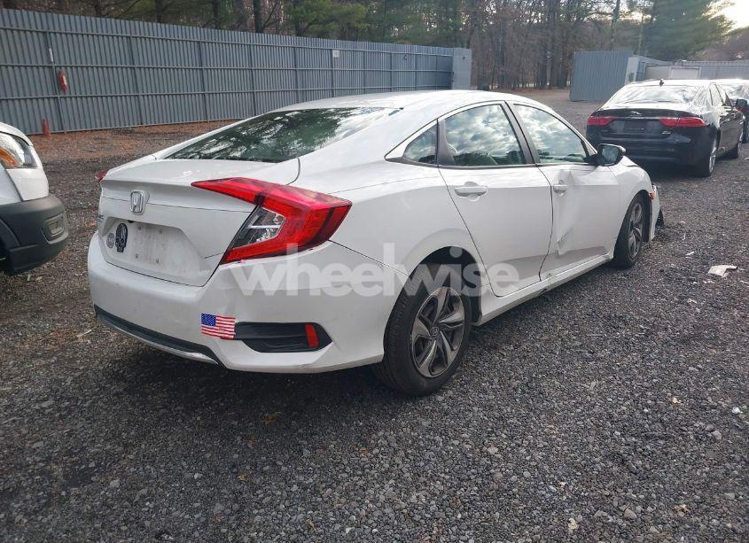 Photo 4 of 2019 Honda Civic LX (VIN 19XFC2F63KE203225)