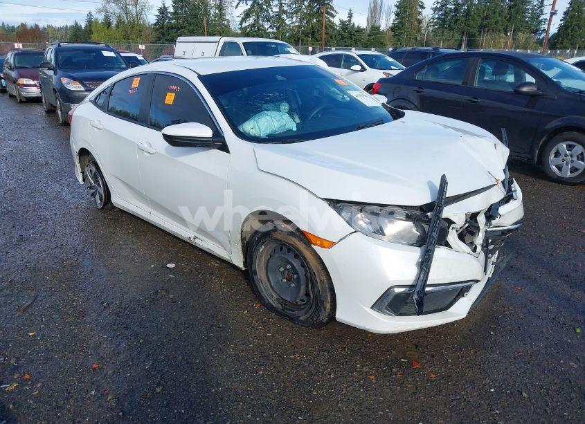 2019 Honda Civic LX (VIN 19XFC2F63KE208733) main photo