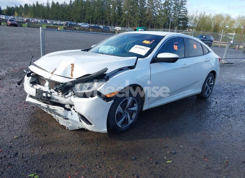 Photo 2 of 2019 Honda Civic LX (VIN 19XFC2F63KE208733)