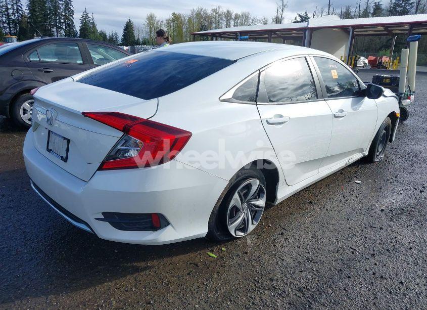 Photo 4 of 2019 Honda Civic LX (VIN 19XFC2F63KE208733)