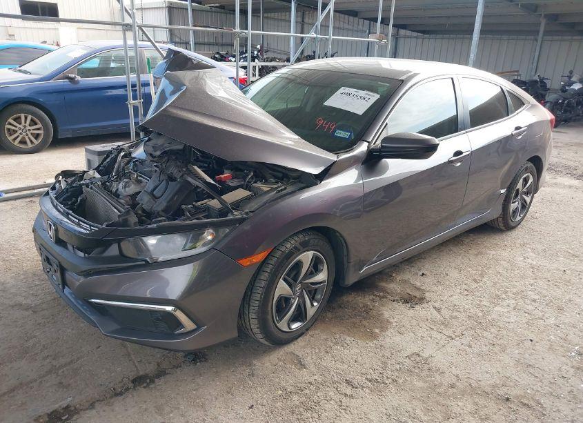 Photo 2 of 2020 Honda Civic LX (VIN 19XFC2F63LE008825)