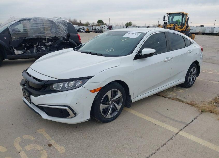 Photo 2 of 2020 Honda Civic LX (VIN 19XFC2F63LE024135)