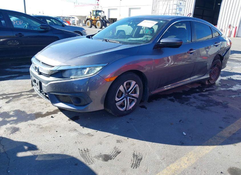 Photo 2 of 2017 Honda Civic LX (VIN 19XFC2F64HE055157)