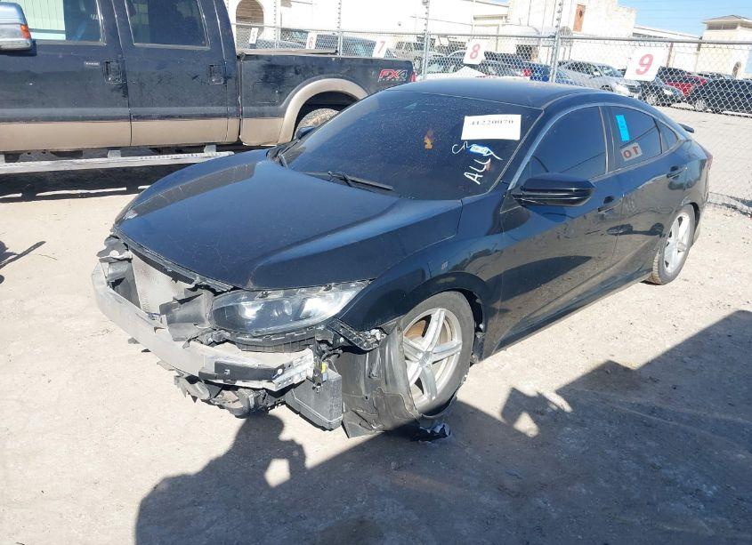 Photo 2 of 2019 Honda Civic LX (VIN 19XFC2F64KE001297)