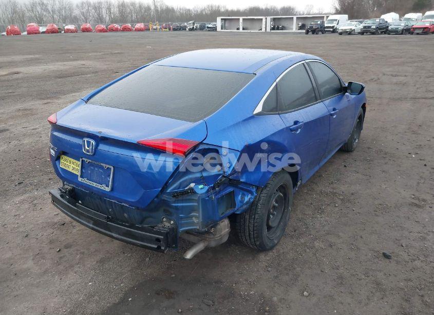 Photo 4 of 2019 Honda Civic LX (VIN 19XFC2F64KE029682)
