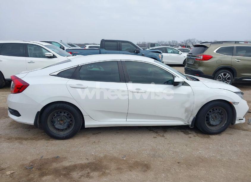 Photo 13 of 2019 Honda Civic LX (VIN 19XFC2F64KE034297)