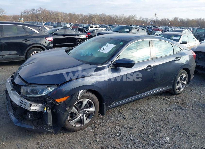 Photo 2 of 2020 Honda Civic LX (VIN 19XFC2F64LE211335)